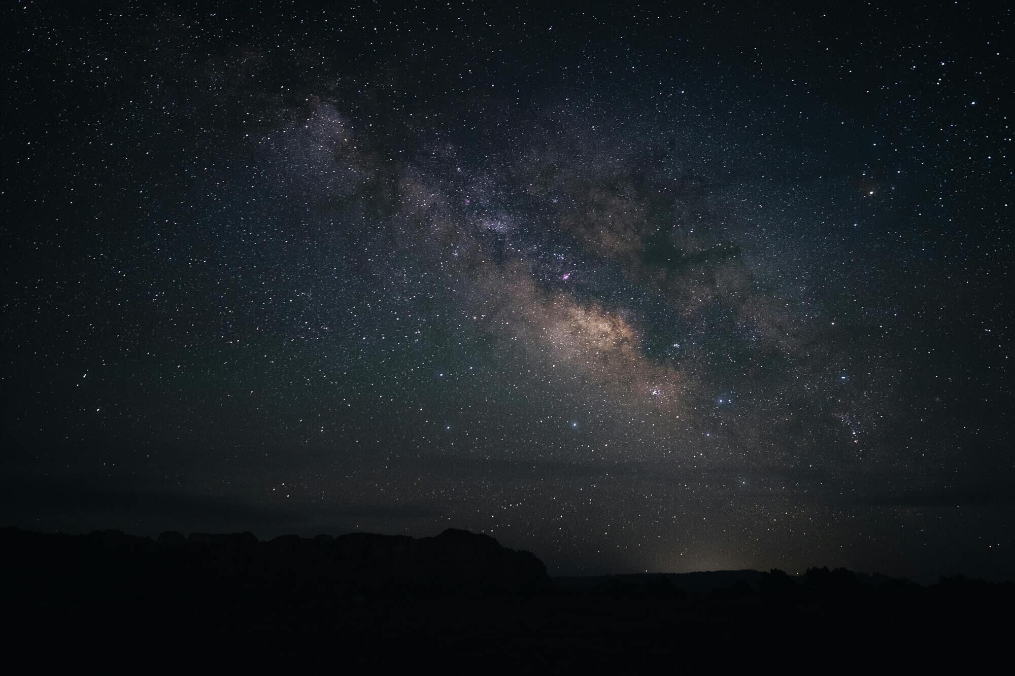 Clear night sky filled with stars and the Milky Way over the Berkshire Hills in Massachusetts