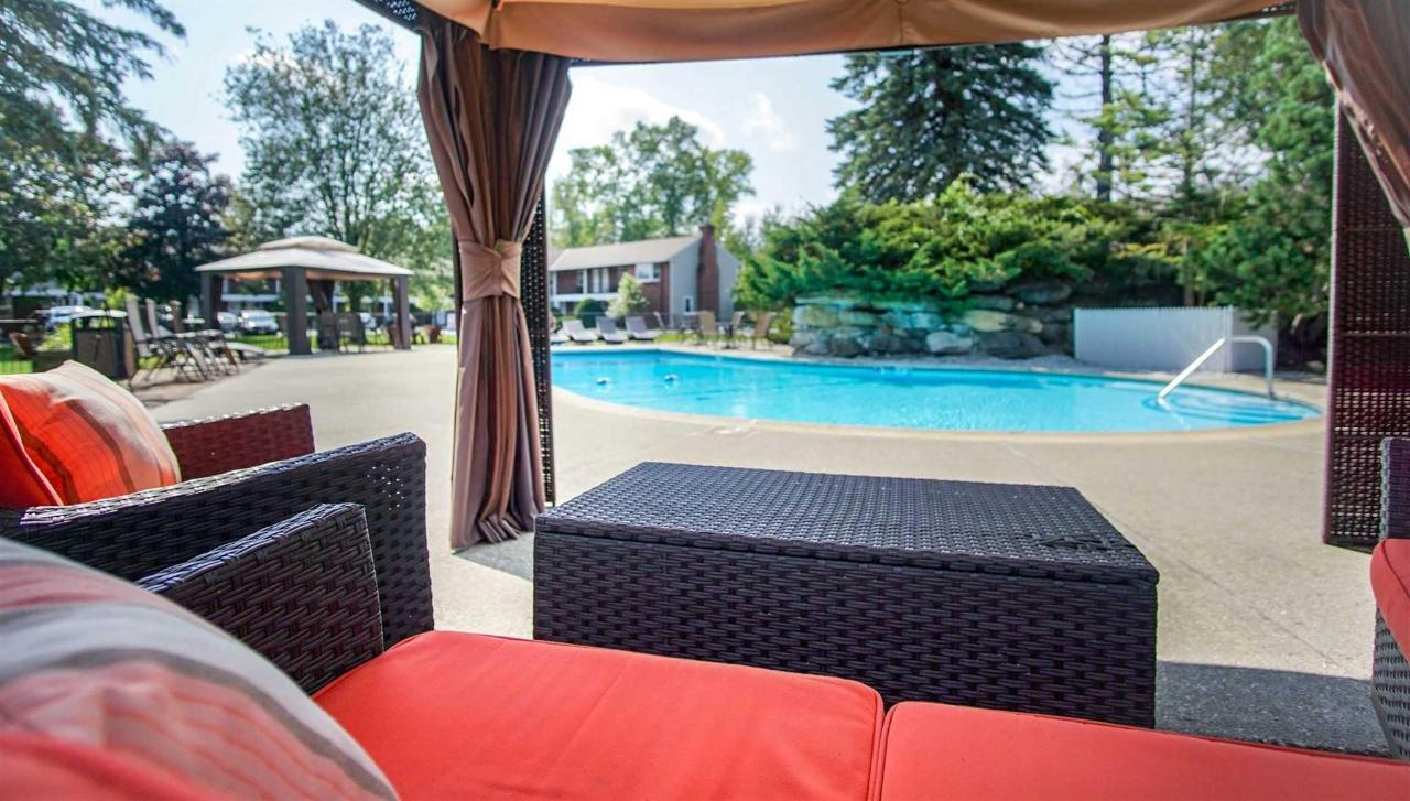 A view of the pool from the patio furniture 